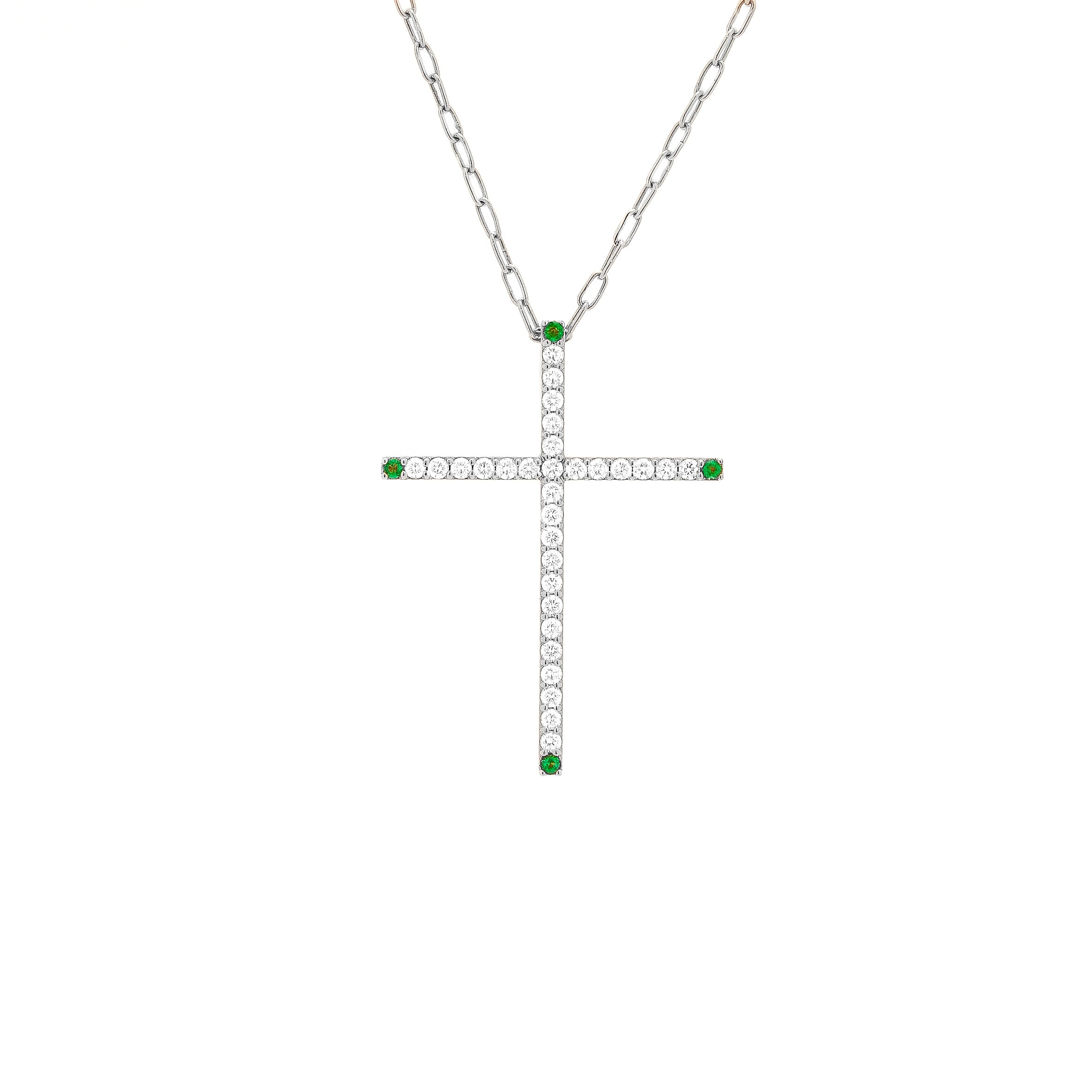 gold cross pendant necklace with white diamonds and emeralds.