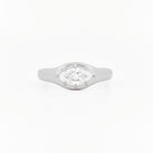 Signet Pinky Diamond ring, in white gold, on a with a white background