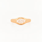 Signet Pinky Diamond ring, in yellow gold, on a with a white background