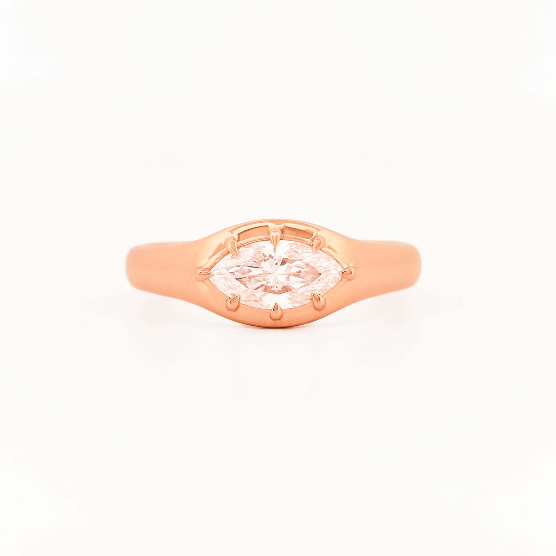 Signet Pinky Diamond ring, in rose gold, on a with a white background