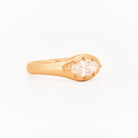 Signet Pinky Marquise Diamond ring, in yellow gold, on a with a white background
