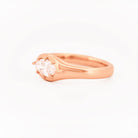 Signet Pinky Marquise Diamond ring, in rose gold, on a with a white background