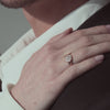 Rose gold ring with diamond cluster daisy flower on hand