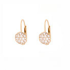 Pair of yellow gold earrings with a flower made of diamonds on a white background